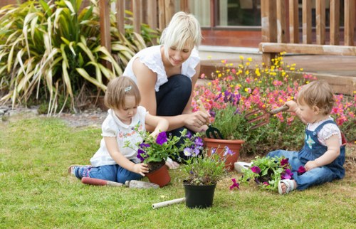 Close-up of a gardener using tools with clear labels and high-contrast gloves