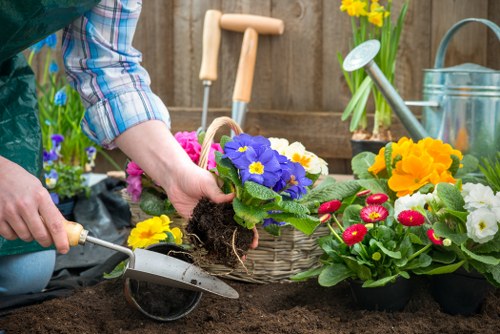 Lawn care professionals trimming grass